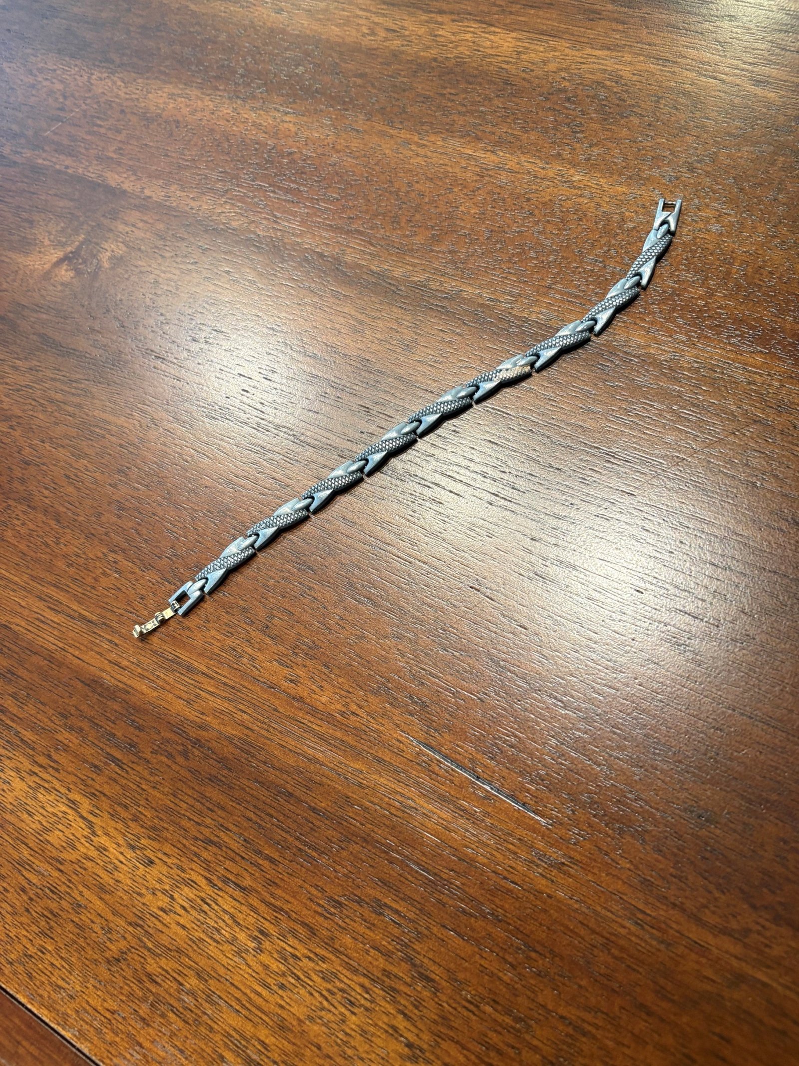 Found after the Fiesta Night Dinner May 22. Under the library table.